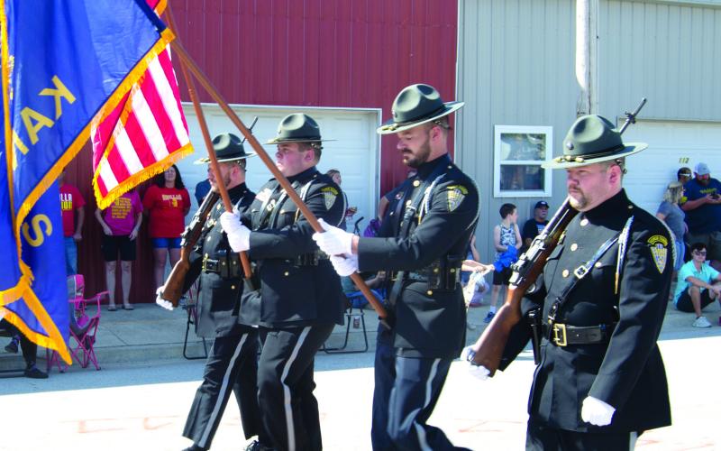 Members of the Cherokee County Honor Guard carried the American and Kansas flags during the annual Weir Homecoming parade held Saturday , September 17. Members of the Honor Guard include Logan Cloyd, Nate Jones, Logan Grant and Noble Dobkins.