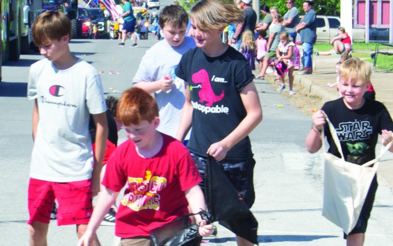 Everyone loves candy and these youngsters were racing to grab their favorite pieces during the annual Weir Homecoming Parade held September 17.