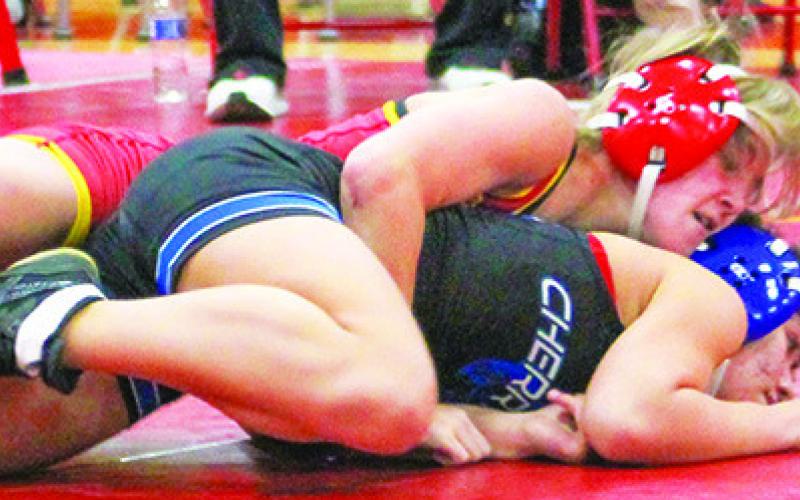 Lady Titan Freshman, Tatum Kirk, won five matches with one forfeit in the Columbus Duals, Friday at the CUHS Gym.