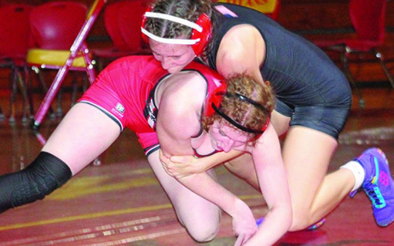 Katie Simpson, senior, reversed a pool match loss to Burlington’s, Haylei Potter, to help bring the championship title to the Lady Titans, Friday, at CUHS.