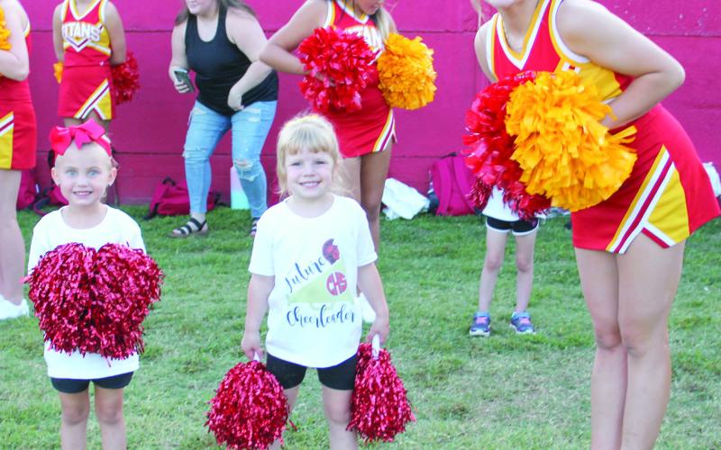 Alivia Burns and Kenzie Kirk joined Macey Allison for the halftime show at a recent football game.