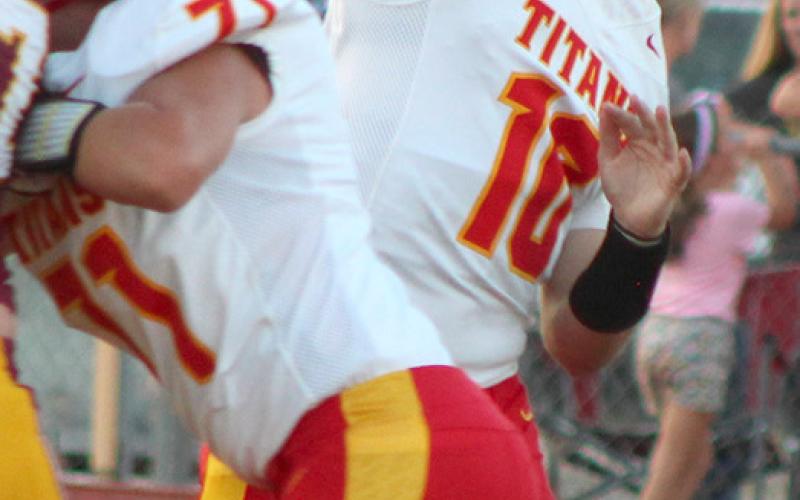 Titans stumble in Girard opener