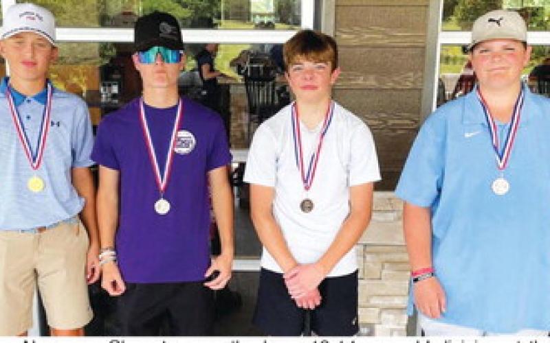 Connor Newman, Chanute, won the boys 13-14 year-old division at the Columbus Junior Golf Tournament, Thursday, Michael Caldwell, Coffeyville placed second, Easton Long, Columbus was third and Gavin Woody, Coffeyville, was fourth. Columbus golfers (not pictured), Kaden Rowe and Alex Welch placed just outside the medals in fifth and sixth place, respectively. The older divisions of the Junior Golf Program will compete in Chanute, Thursday. The younger players will be in Parsons. Courtesy Photo.
