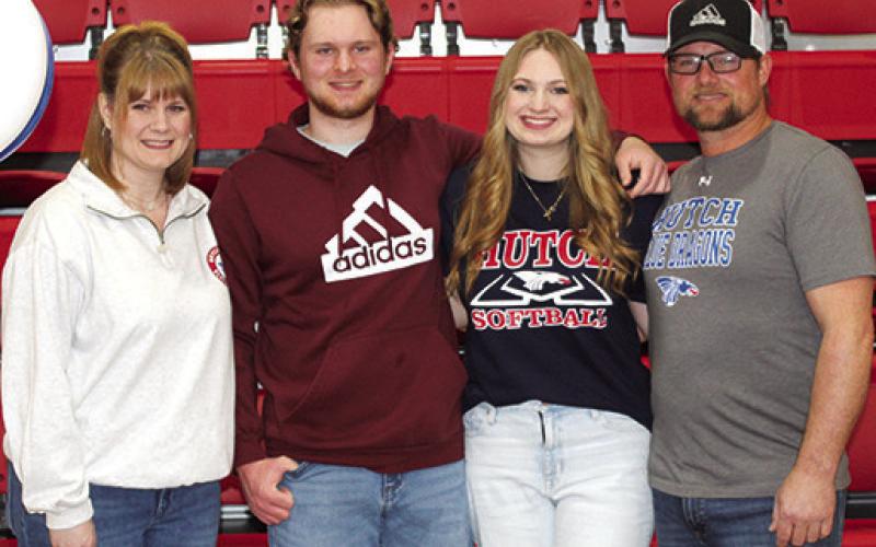 Lady Titan Senior, Hailey Ediger, signed a National Letter Intent to continue her softball career at Hutchinson Community College this fall. She was joined by her friends and family, Kandice Ediger, Cody Ediger, and Joel Ediger at the signing ceremony, February 21, at the Columbus Unified High School Gymnasium.