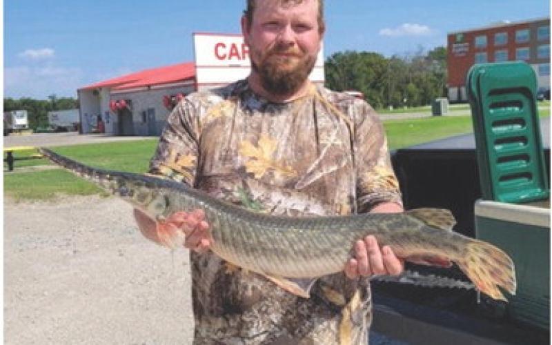 Michael Starr Jr. was fishing at Big Hill Reservoir in Labette County in late July when he successfully reeled in a 34.5-inch spotted gar weighing 7.98 pounds. The catch broke a 40-year Kansas State record set in 1983 at the Chetopa Dam. Courtesy Photo.