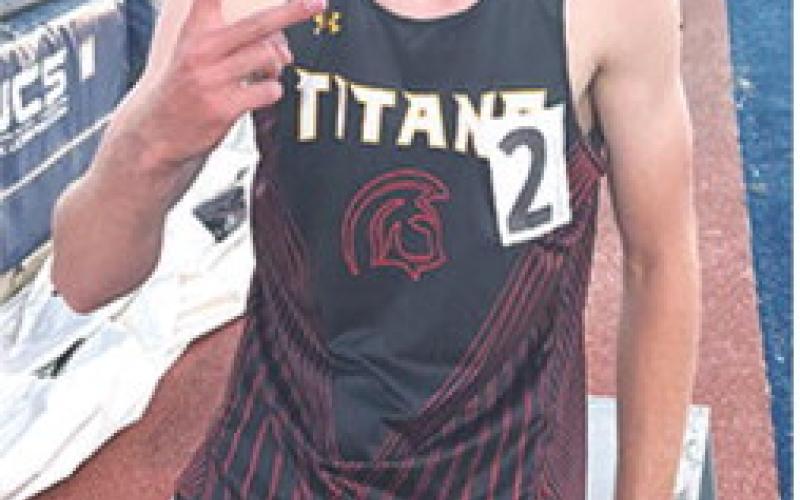 Titan Junior, Levi Simpson, has surpassed a personal and school best mark and met a goal he’s been working on since he stepped on the high school track team. Friday at the Thad Clements Invitational Track and Field Meet in Chanute, Levi ran 800 Meters in a time of 1:59.1 minutes, breaking the 2009 school record set by Wade Robinson of 2:01.66 minutes. Courtesy photo.