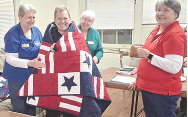 A Quilt of Valor was presented to SSgt Bruce Akuna (above) January 20. Akuna served 1982-1989 in the United States Navy. His duty stations included Boston Spa, N.Y., San Diego Calif. Treasure Island, Calif., Bengor Wash. and the USS Carl Vinson. (Below) A1C Lisa Akuna was presented with a Quilt of Valor for her service 1983-1986 in the United States Air Force. Her duty stations included Mather AFB Hospital. Courtesy photo.