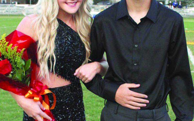 Lady Titan Senior, Harley Long, was chosen as 2023 Fall Homecoming Attendant, Friday night, prior to the football game with St. Mary’s-Colgan. Harley is the daughter of Heather and Tim Sinclair and Nate and Casey Long. She was escorted by Colton Helwig, son of Todd and Denise Helwig.