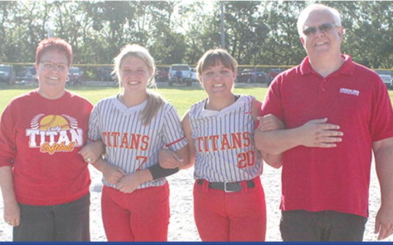 Lady Titan Seniors, Morgan Richards and Mackenzie Richards, (right) were recognized on Senior Night at Rockette Field, May 11, during the double header split with Riverton. The sisters are four-year members of the Lady Titan Softball Team. They were escorted by their parents Kim and Drew Richards.