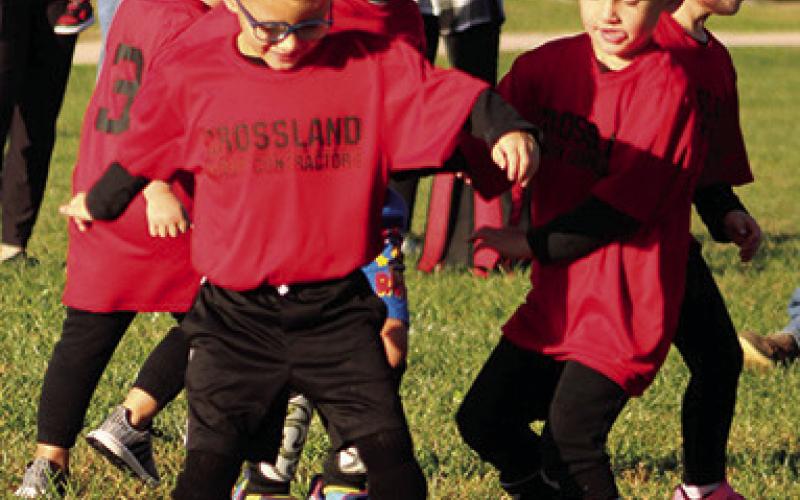 Columbus Area Youth Soccer will complete their season tomorrow at Eddington Park. All age groups will be in action beginning at 8 a.m. Bronson Dainty looks to make a pass while teammate Rowan Benedict assists during recent action on the Froebe Fields soccer pitch.