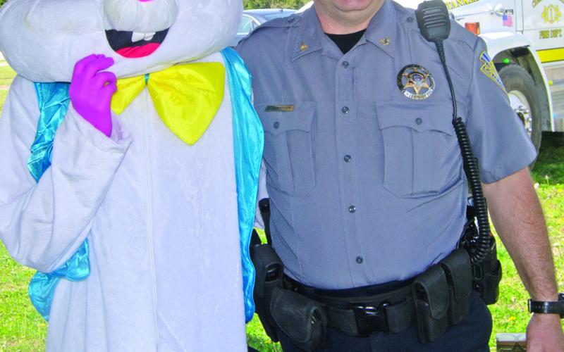 Sheriff Brian Henderson took some time to visit with the Easter Bunny at the annual Weir Easter egg hunt. The Sheriff’s Department as well as other emergency service agencies had vehicles on site for the kids to see.