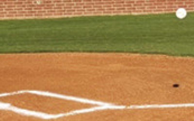 Nixon Westervelt, right, grandson of Joe Pat Skye, threw out the first pitch of the Seventh Annual Joe Pat Skye Memorial Tournament at the Field of Dreams in Baxter Springs. Courtesy Photo.