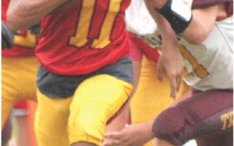 Titan Seventh Grader, Jayden Dohle, broke away for a 29-yard touchdown run for the final score of the game, increasing the Columbus win, 34-6, over the visiting Girard Trojans, Monday night at Titan Stadium. Dohle scored four touchdowns and two, twopoint conversions on the night.