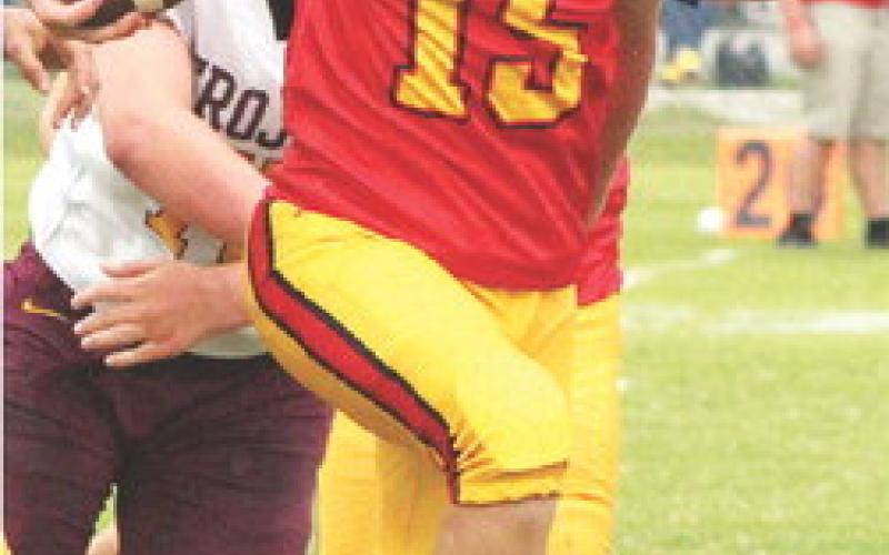 Jace Gaither, Seventh Grade Titan Quarterback, ran 20 yards for Columbus touchdown in the 34-6 win over Girard at Titan Stadium, Monday.