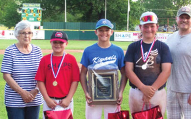 The 42nd Bart Myers Sportsmanship Award Presentation was held June 8 at the Little League field in Baxter Springs. Left to right Bob Myers and Shirley Myers, nominee Grady Roller, winner Braydon Wade, nominee Brooks Walker, 2001 winner Bryce Culler and Wayne Metcalf former league president. Photo by Michael Rodgers.