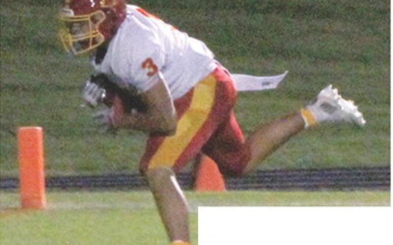 Jayden Rodriguez, senior, came down with the catch from sophomore, Cole Howard and ran into the end zone for a 35-yard touchdown in Titans 13-20 loss in Galena, Friday.
