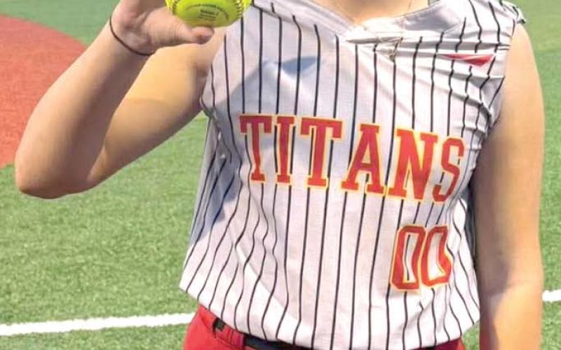 Lady Titan Junior, Landrey Perry, blasted a shot over the outfield fence in the Thursday, non-conference, double header loss in Pittsburg, 1-7 and 2-16. Courtesy photo.