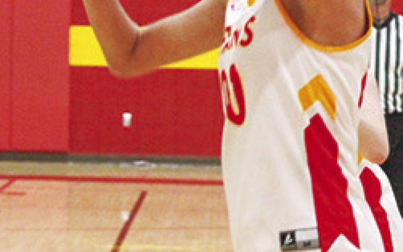 Lady Titan Addilyn Wilson takes a shot during an early season game on her home court. Columbus wrapped up their regular season with losses at Frontenac, Tuesday.