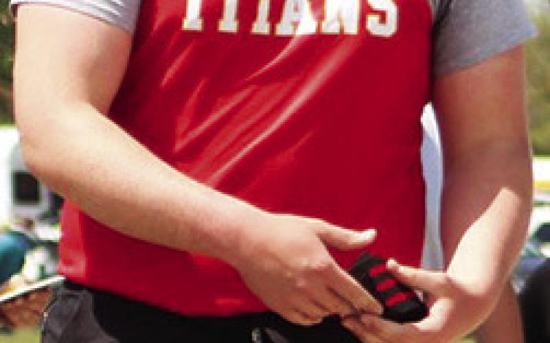 Titan Sophomore, Carter Henry, placed fifth in the discus, Friday, at the Annual Optimist Track and Field Meet in Girard.