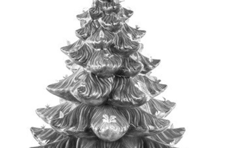 Merry Christmas. Ceramic trees like this one have color, light, and, in this case, music. And they last for decades with no risk of drying out and losing their needles. Photo Caption: Keystone Auctions LLC (c) 2025 by Cowles Syndicate Inc.