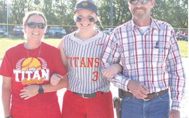 Lady Titan Senior, Trinity Green, was recognized on Senior Night at Rockette Grafel and Juston Grafel. Field, May 11, during the double header split with Riverton. Trinity is a two-year member of the Lady Titan Softball Team. She was escorted by her parents Ryan and Todd Lacen.