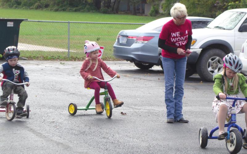 Pre-Kindergarten students ride tricycles for St. Jude