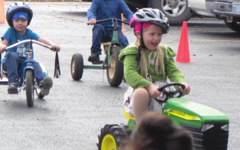 Pre-Kindergarten students ride tricycles for St. Jude