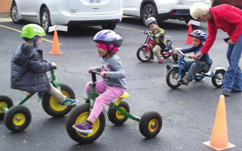 Pre-Kindergarten students ride tricycles for St. Jude