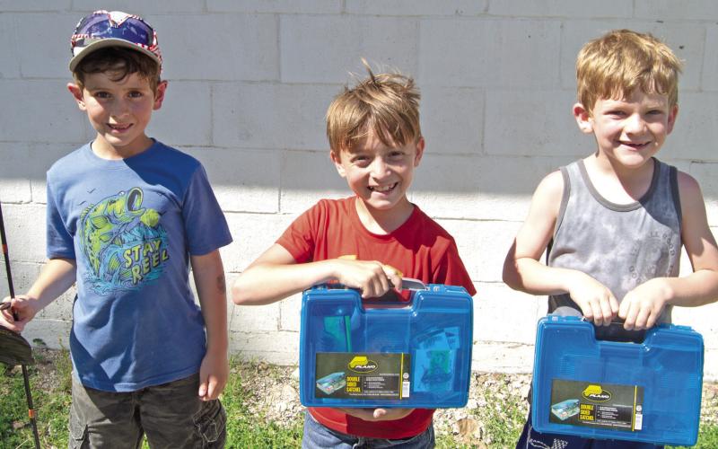 The seven to nine age group casting contest winners during the Sportsman’s Club Fishing Tournament included first place winner Cash Dowell casting to 8 -inches from the target, second place winner Bryer Dunham, 11-inches from the target and third place went to Abel Ellison with a cast 12-inches from the target.