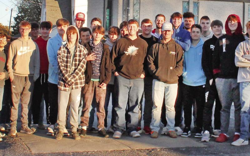 Volunteers distribute Thanksgiving boxes to community