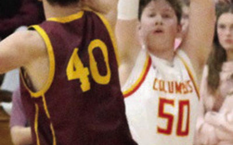 Titan Senior, Huck Hallam, gave Columbus their only lead, 3-2, with his three-point shot early in the 32-58, Columbus loss to Girard, Friday night at the, CUHS Gymnasium.