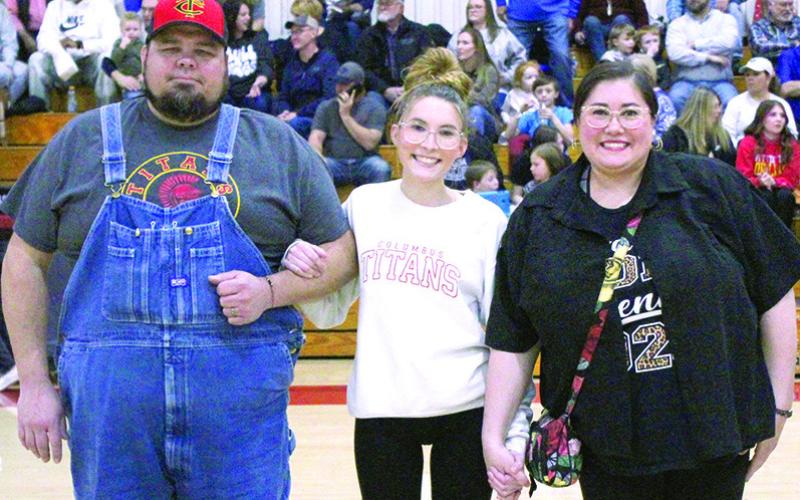 Spirit Squad Seniors recognizedrestling Cheer Squad. She was escorted by her parents Josh and Tiffany Green.