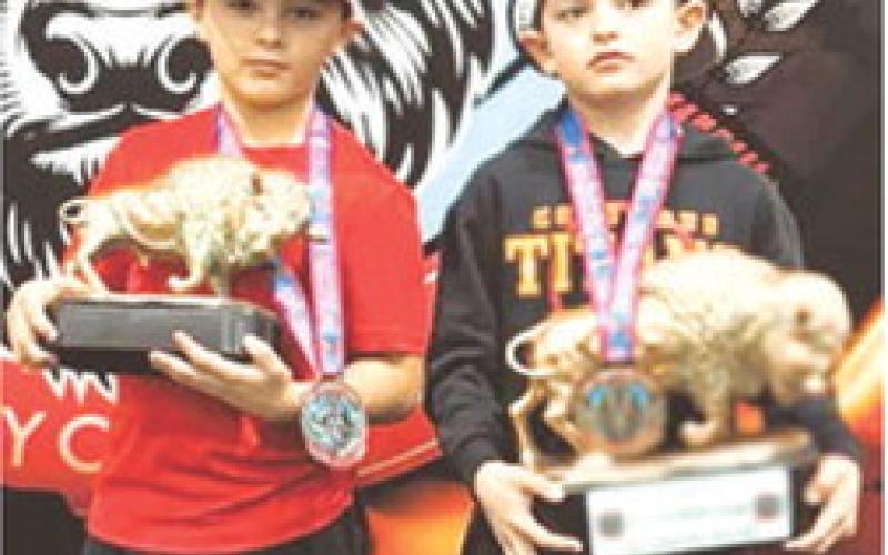 Bearett Bowin placed second, and Jack Jessee, first at the KC Frontier Feud, Saturday, in Kansas City. Jack won the 8U, 55 pound novice division and Bearett was runner up in the 8U, 76 pound open division. Courtesy photo.