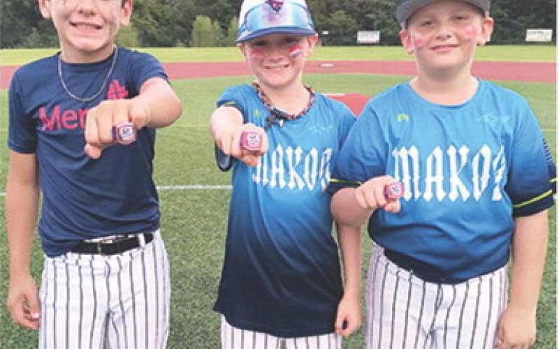 Three local ball players brought home the hardware in their first fall season tournament of the year. Lucas Haviland, Lee Snow, and Cruz Sharp played in the tournament with their fall baseball team, the Fox Sports Sox, in their season opener over the weekend in Fayetteville, Ark. The team had five wins and no losses to earn their championship rings. Courtesy photo.
