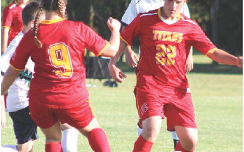 The Columbus Unified High School Soccer Team has had two games this season, against Thomas Jefferson Day School from Joplin, Mo. and Liberty Home School. The team is working hard and gives full effort on the pitch and off. Sophomore, Gabe Edwards, controls the ball after receiving a pass from senior, Taryn Billings, on their home pitch recently. The team is tentatively scheduled for a game with Parsons, today at 4 p.m. at the Central School Soccer Pitch.