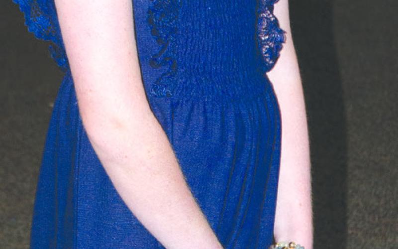 Emily Harris talks to Dorothy Neely about how much her jumpsuit was and where she would wear it to. Harris was taking part in the Style Revue held Saturday July 15 at the First Christian Church in Columbus.