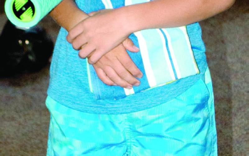 Samuel King shows off his best summer active wear. He is ready for a day at the beach or the pool. He was participating in the Style Revue held Saturday, July 15 at First Christian Church in Columbus