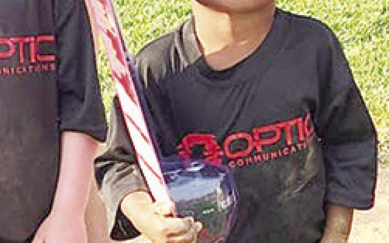 Miles Reeves was the winner of the fishing pole in the Cal Ripken League fundraising drawing held during closing ceremonies, Tuesday. Courtesy Photo.
