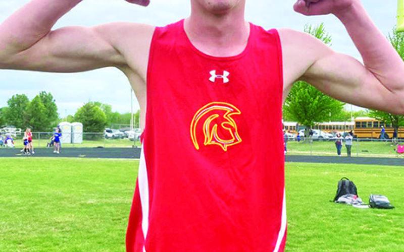 Columbus Titan Eight Grader, Levi Simpson, set three new school records at the CCC Junior League Meet, Tuesday, in Frontenac. Simpson improved his own school record marks in the 800M and 1600M runs and is a member of the record setting 4x400M Relay Team. Courtesy Photo.