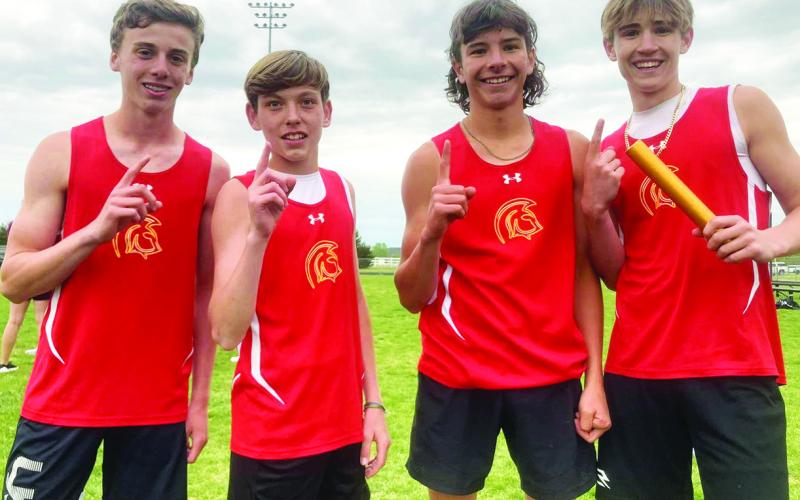 The Columbus Titan Eighth Grade 4x400M Relay Team set a new school record with a time of 4:02.7 minutes, eclipsing the 1990 mark of 4:07 minutes held by Bill Maxton, Robert McAllister, Mike Palmer, and Brad Burns. The record was set at the CCCJL Meet, Tuesday, in Frontenac. Courtesy Photo.