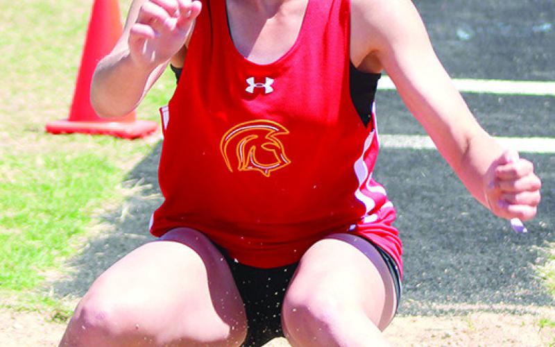 Lady Titan Eighth Grader, Tatum Kirk, placed fourth in the long jump at the junior high league meet in Frontenac, Tuesday. The meet was the final of the season for the young Titans.