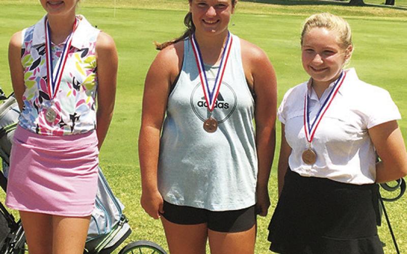 Cali Carpino, Fallon Smiley, and Avery Neely, placed second, third and fourth in the Girl’s 12-14 age division of the Independence Junior Golf Tournament, Thursday. Avery S. from Coffeyville, took first place, shooting 55 in nine holes. Courtesy Photo.