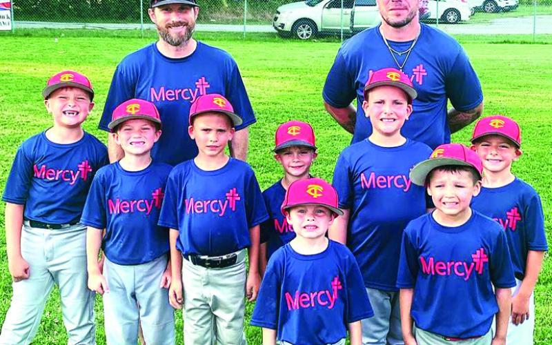 The Columbus Mercy T-Ball Team stopped for a photo following the last game of the season in June. The members are: Kelsi Moss, Griffin Walters, Logan Simpson, Drake Hamilton, Sawyer Gregory, Patrick Hickman, Jackson Haviland, and Clay Watkins. The team is coached by Dan Walters and Matt Haviland. Brayson Dowell was not present for the photo. Players attending the Columbus Cal Ripken League Closing Ceremonies received medals for their participation this season. Courtesy Photo.