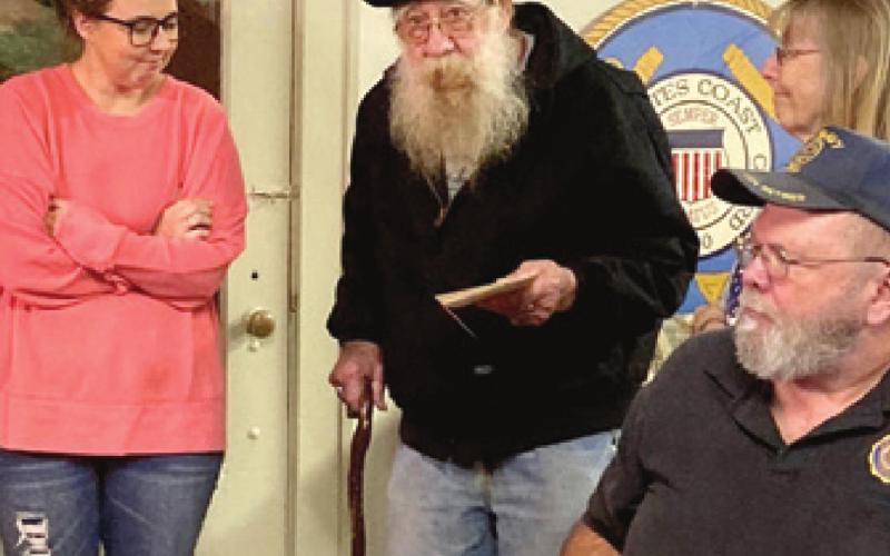 During the American Legions Post 206 Christmas Dinner in Baxter Springs, Steve and Beverly Dunn presented Jessica Brown with a memorial donation to go toward her husband, Malachi Brown’s medical expenses. Photo by Dee Riley