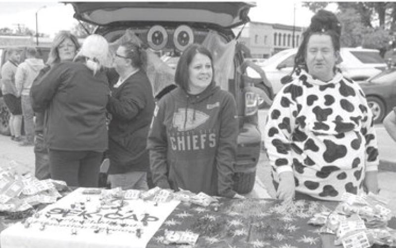 ber of Commerce Halloween Walk Friday, October 31. The line to the event wrapped north Kansas and west on Maple.