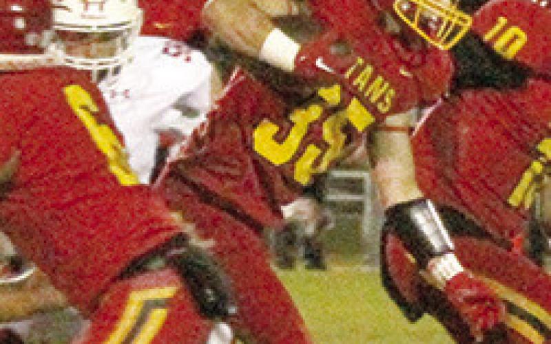 Titans cage Lions in District 1 win