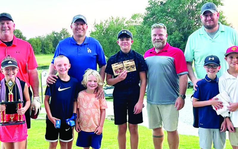 The Columbus Junior Golf Program hosted a Youth/Adult Scramble format tournament with 20 teams, competing for trophies and prizes. Winners in the B Flight were Sophia and Larry McReynolds. Bode and Jacob Saiz took third place as brother Cal cheered them on. Easton and Nathan Long finished in fourth place and Kamden, Kasen, Adam Sallee placed second. The tournament was held August 10 at the Brush Creek Golf Course to close out the Junior Golf Program’s season. Courtesy Photo.