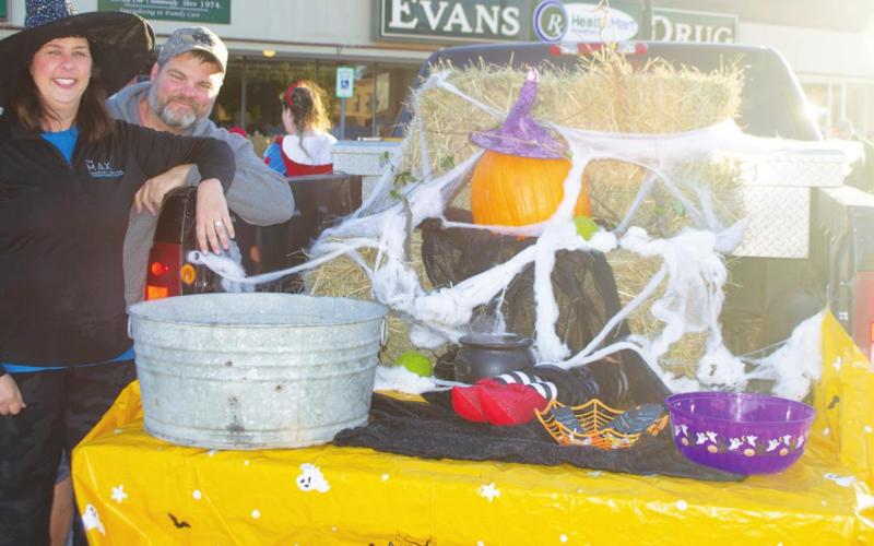MAX Therapy owners Todd and Susan Campbell stand next to their Trunk or Treat display at this year’s Columbus Halloween Walk. All of the cars participating in the Trunk or Treat competed for a prize for their displays. The Campbell’s were ultimately selected as the winners, receiving a $50 gift card for their hard work. Photo by Jacob Spencer
