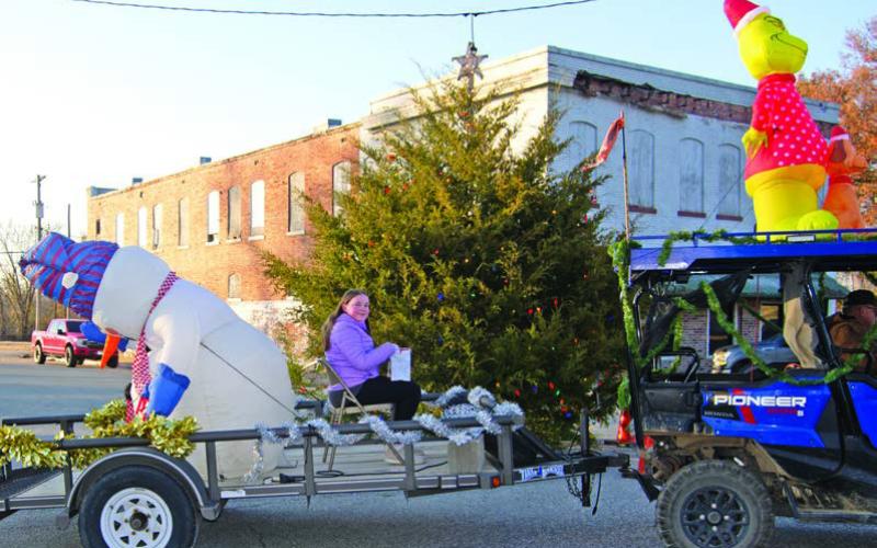 With the Grinch leading the way, this young lady and her snowman travelled the parade route, passing by the Scammon city Christmas tree. The parade in Scammon Sunday, December 1 was the first of the Cherokee County parade season.