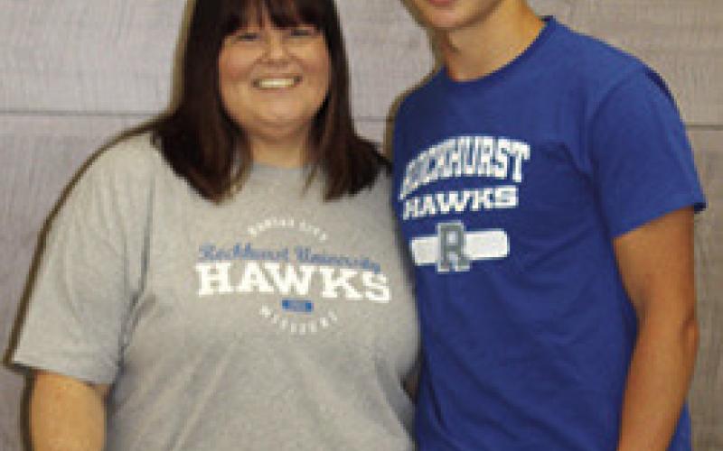 Riverton Ram Senior, Walker Terry, has signed a letter to continue his athletic career at Rockhurst University in Kansas City. Walker will be joining the track and field team. His mother, Stephanie Hailey, was present at his recent signing at Riverton High School. Courtesy Photo.